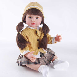 22" Winter Chic Reborn Baby - Cozy Yellow Sweater, Plaid Skirt & Matching Hat (Gray Glass Eyes)