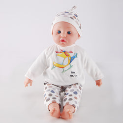 Meimeigirls 16-inch realistic baby doll front view with blue glass eyes, white long sleeve shirt and polka dot pants