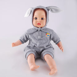 WeFriends 16 inch blinking eye baby doll in gray rainbow romper and bunny hat - front view
