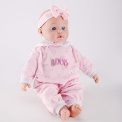 Side view of WeFriends collectible baby doll showing proportions and pink bow headband