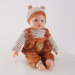 Side view showing doll's striped shirt and bear overalls details