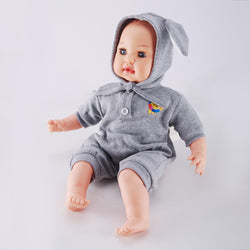 Side view of WeFriends blinking doll showing bunny ears hat details