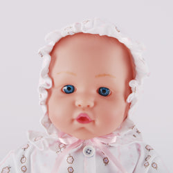 Close-up of glass-like blue eyes and facial features